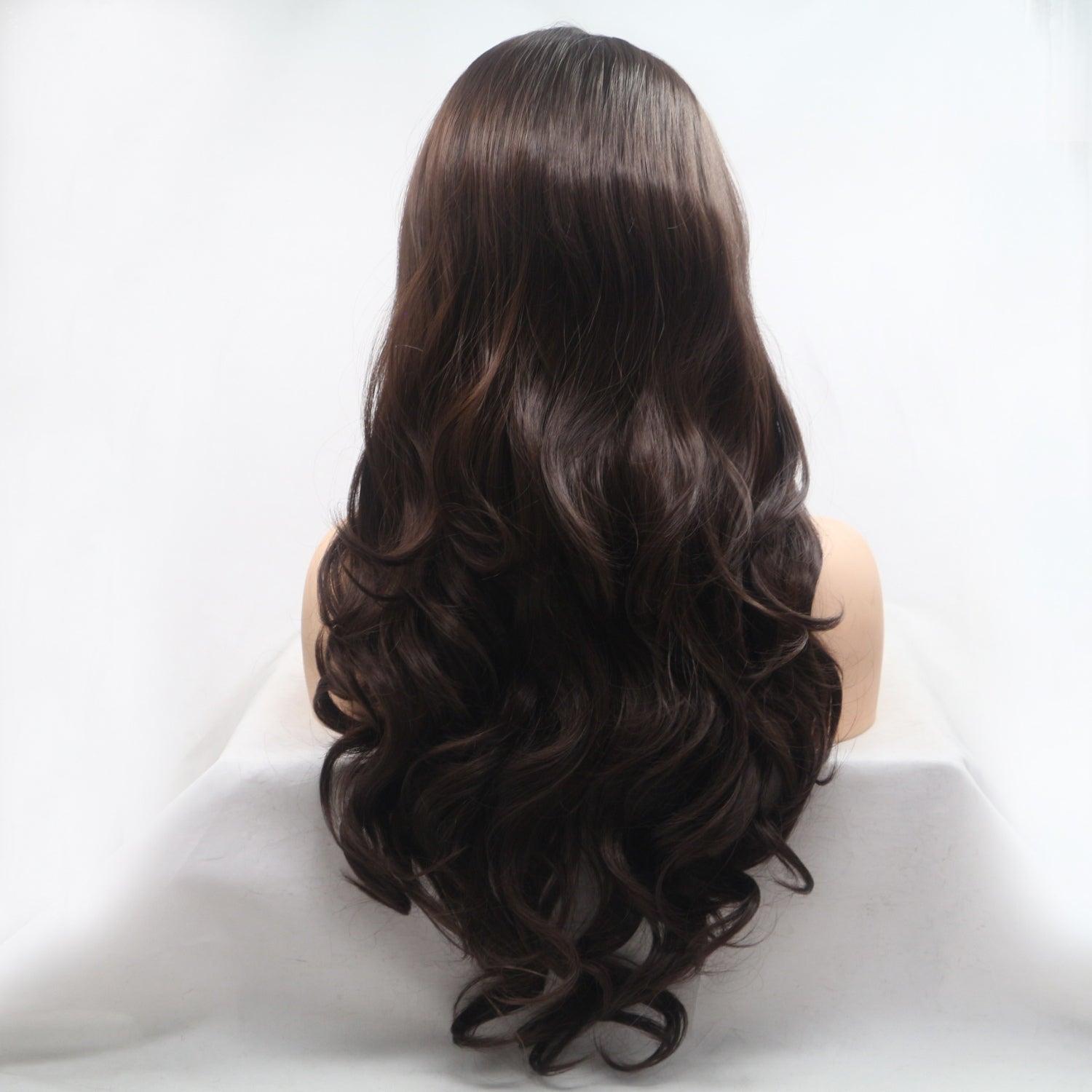 a woman's long dark brown hair is displayed on a mannequin head