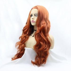 a wig with long red hair on a mannequin head