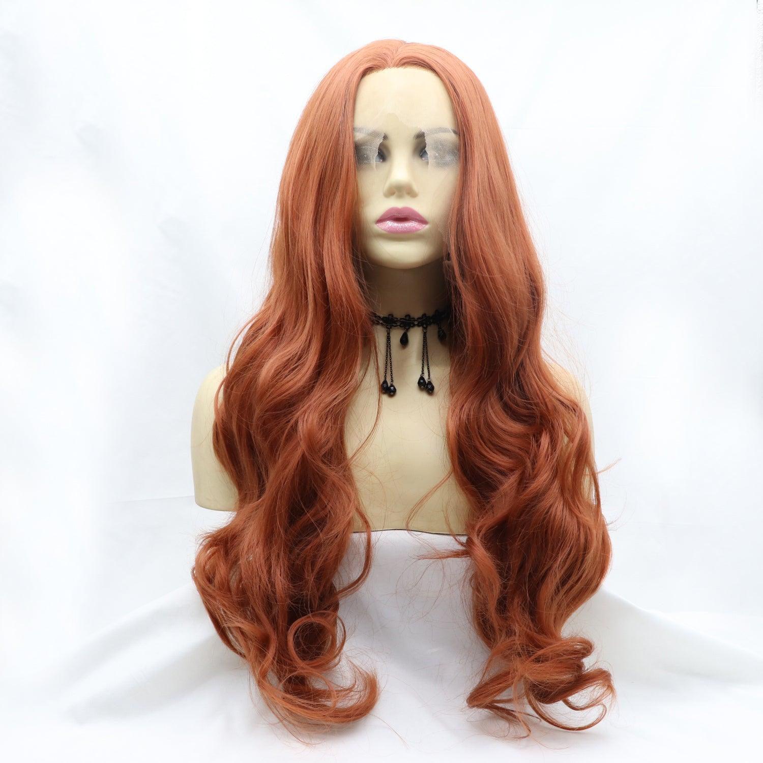 a wig with long red hair on a mannequin head