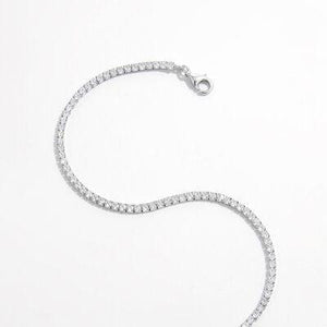 a diamond bracelet on a white background