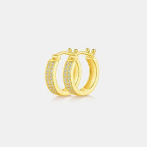 a pair of yellow gold hoop earrings with diamonds