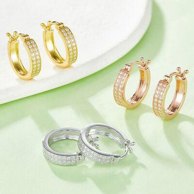 three pairs of gold and silver hoop earrings