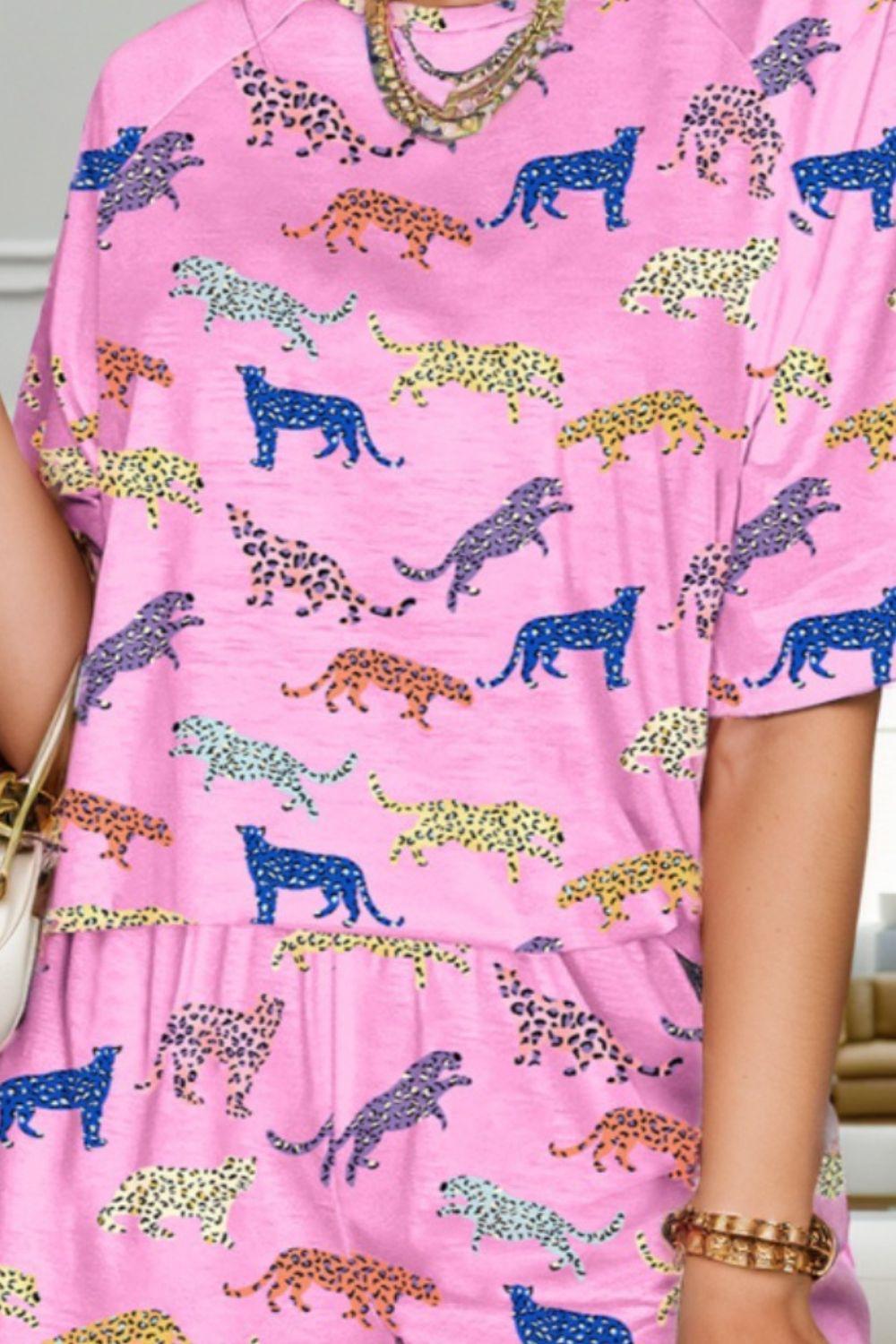 a woman in a pink dress holding a purse