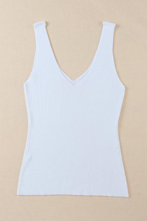 a women's white tank top on a beige background