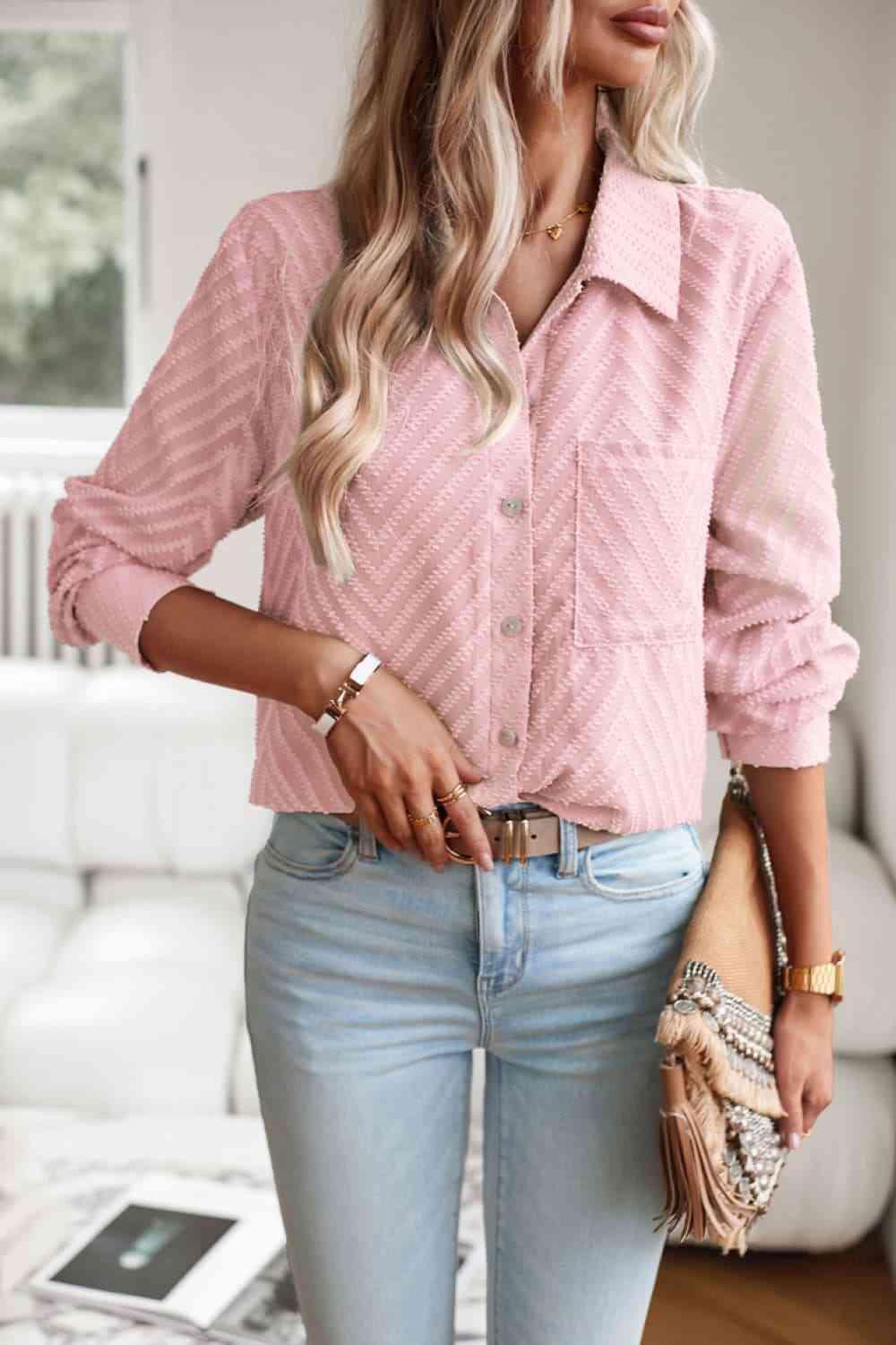 a woman wearing a pink shirt and jeans