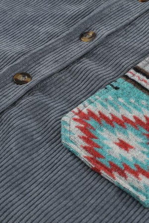 a close up of a sweater with buttons on it