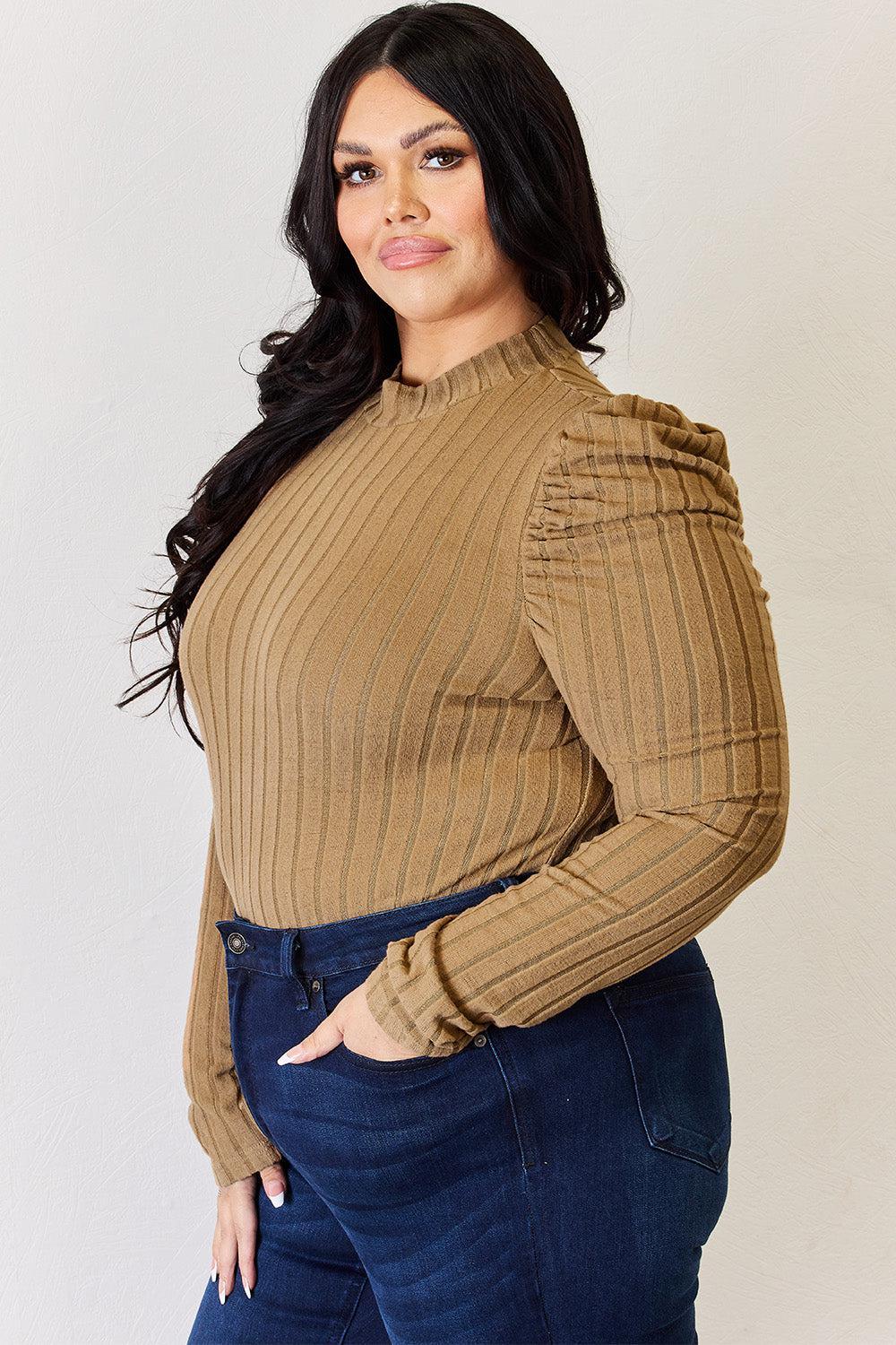 a woman posing for a picture with her hands on her hips