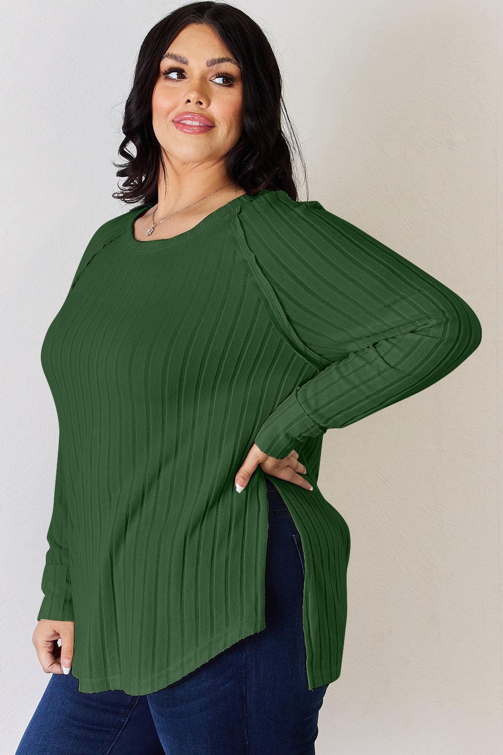 a woman in a green top is posing for a picture