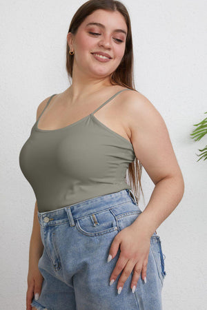 a woman with her hands on her hips