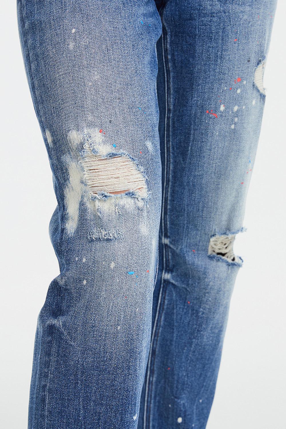 a pair of jeans that have been ripped and have been worn