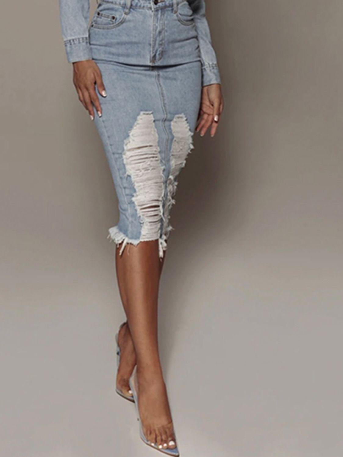 a woman in a jean skirt and heels posing for a picture