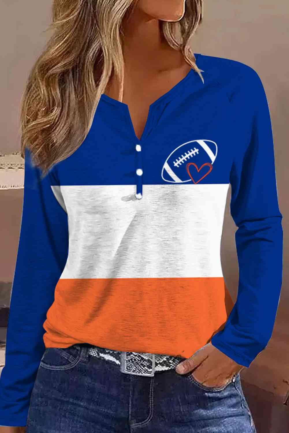 a woman wearing an orange, white and blue shirt