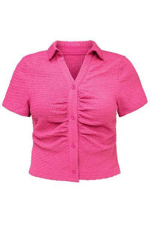 a women's pink shirt with short sleeves
