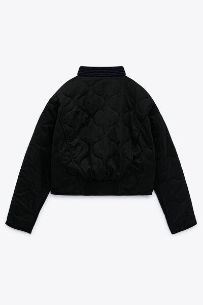 a black jacket with a black collar and sleeves