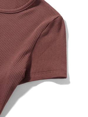 a close up of a shirt on a white surface