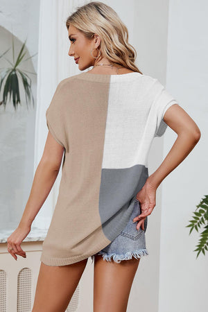 a woman in a short skirt and a sweater