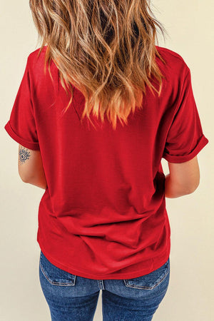 the back of a woman's red shirt