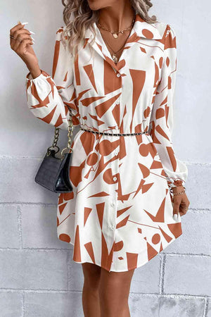 a woman wearing a brown and white dress