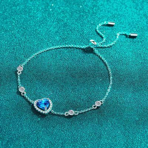 a bracelet with a blue heart on it