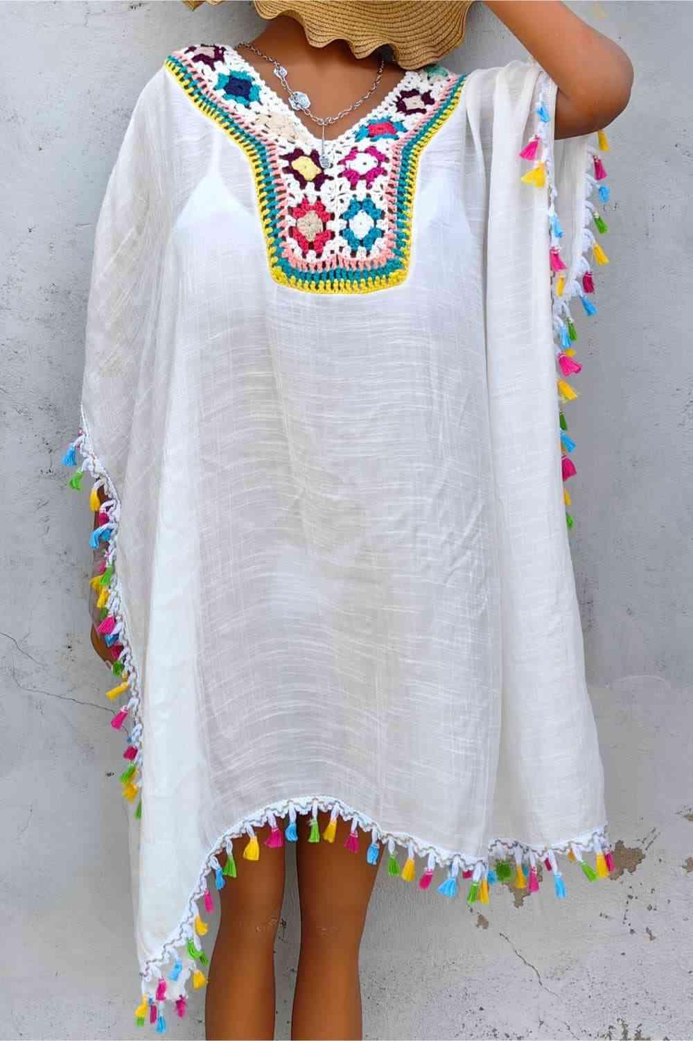 a woman wearing a white dress and a straw hat