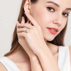 a woman with a ring on her finger