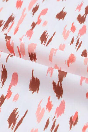 a close up of a pink and brown pattern on a white background