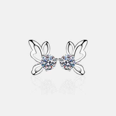 a pair of earrings with butterfly wings