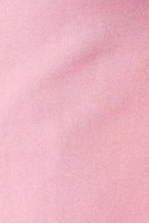 a close up of a pink shirt with a tie