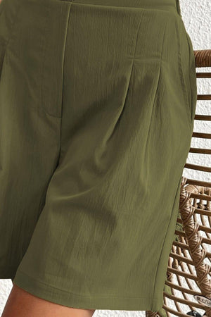 a close up of a person wearing shorts