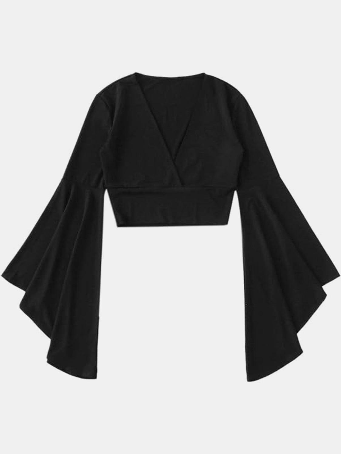a cropped black top with bell sleeves