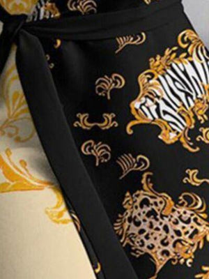 a close up of a dress with a zebra print on it