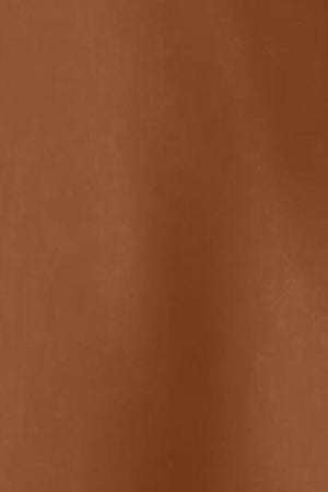 a close up of a brown leather surface