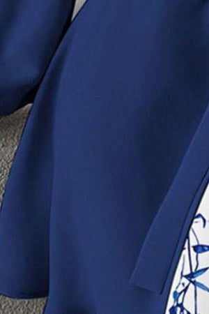 a close up of a person wearing a blue jacket