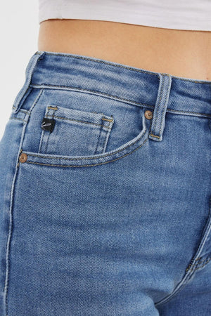 a close up of a person wearing jeans