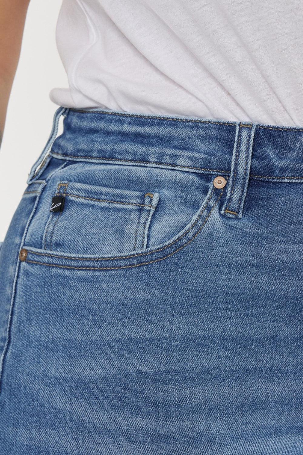 a close up of a person wearing a pair of jeans
