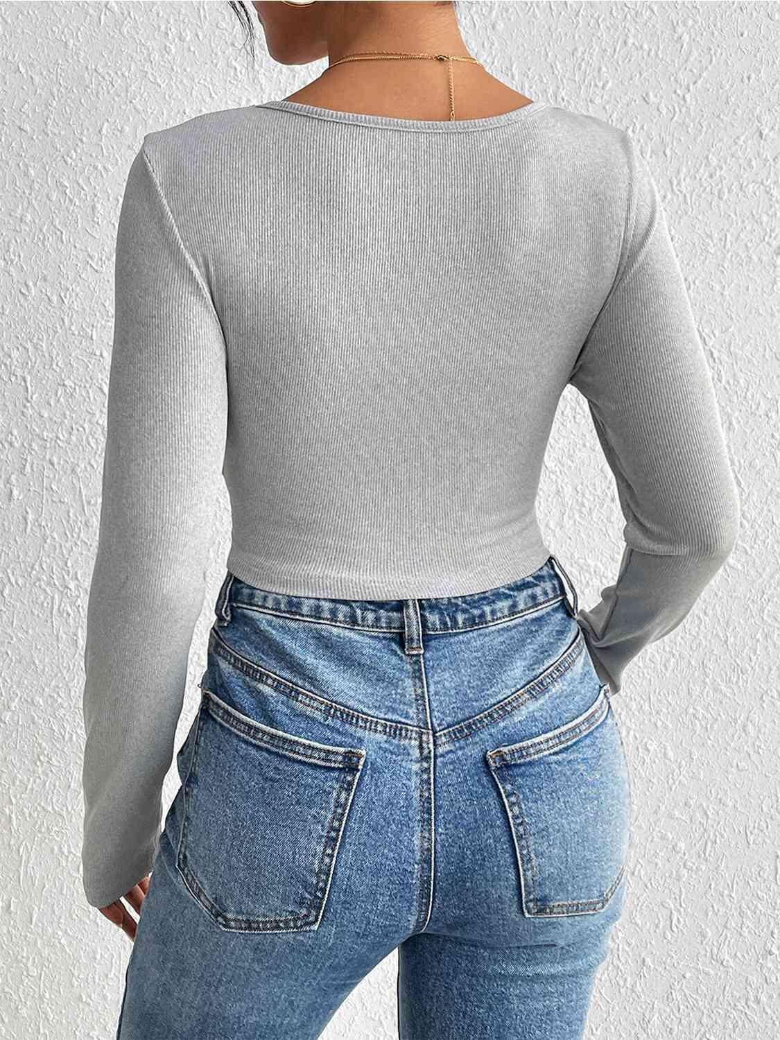 the back of a woman's body wearing jeans