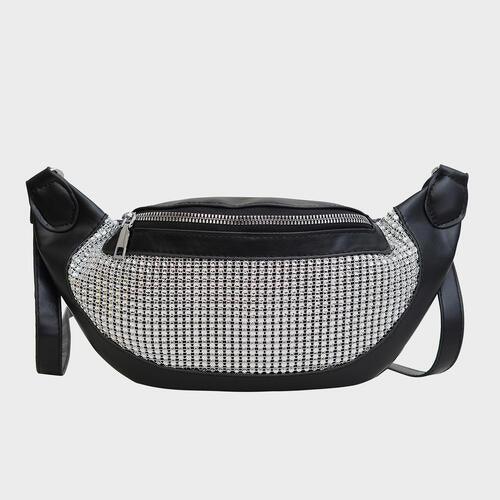 a black and white fanny bag with a mesh pocket