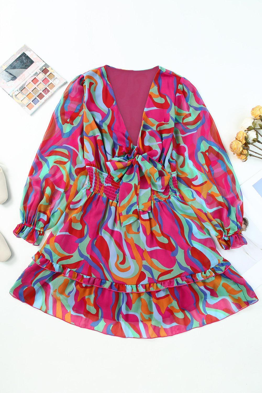 a colorful dress sitting on top of a white table