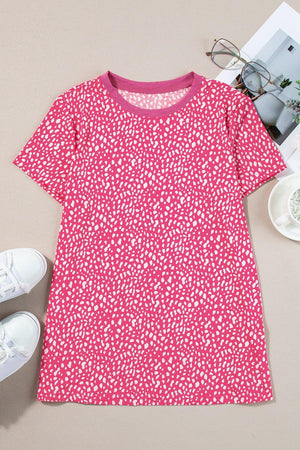 a pink and white dress next to a pair of white shoes