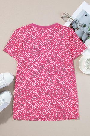 a t - shirt and pair of shoes on a table