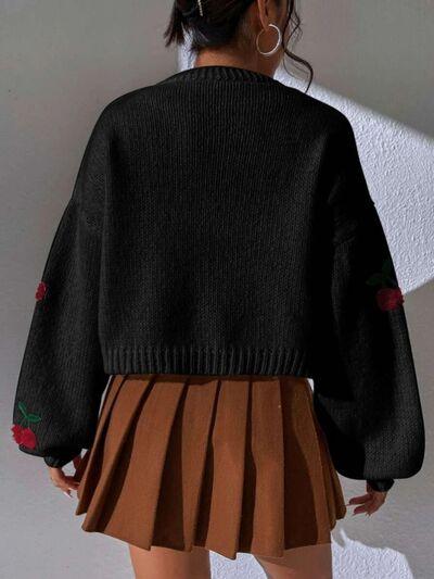 a woman wearing a black sweater and brown skirt