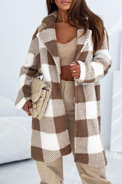 a woman wearing a brown and white checkered coat