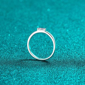 a close up of a ring on a blue surface