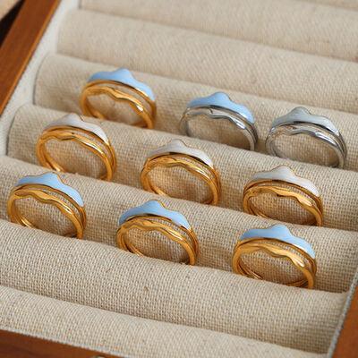 a set of seven rings in a wooden box
