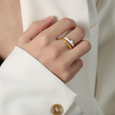 a close up of a person wearing a ring