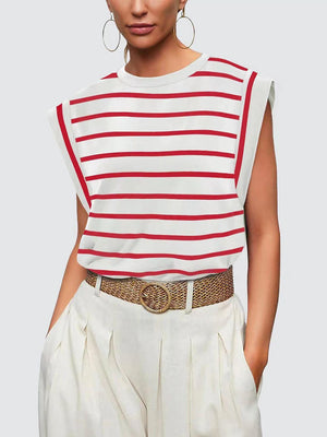 a woman wearing a red and white striped top