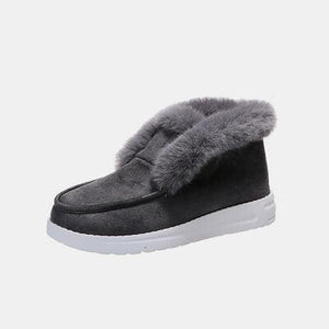 a women's slip on shoe with a fur lining