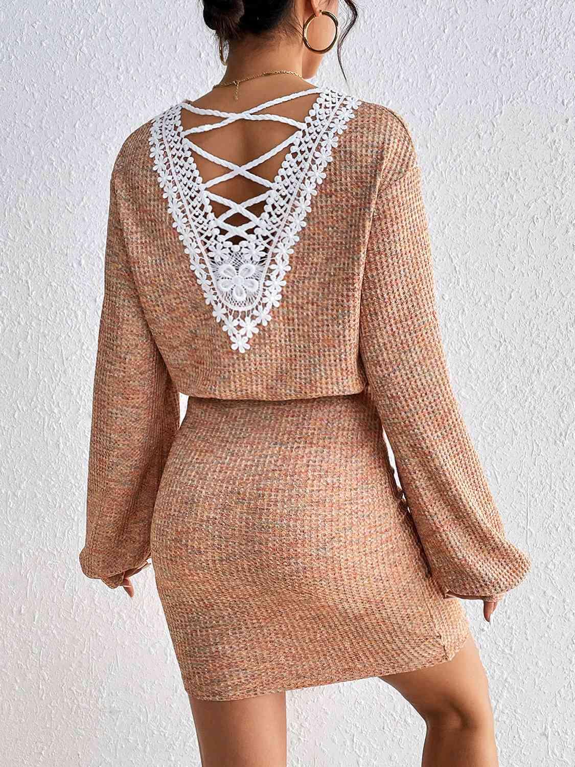 a woman wearing a brown dress with white lace detailing