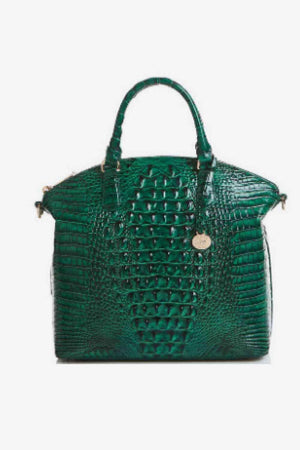 a green handbag on a white background