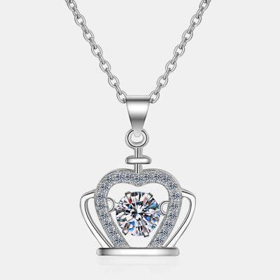 a necklace with a heart and a crown on it